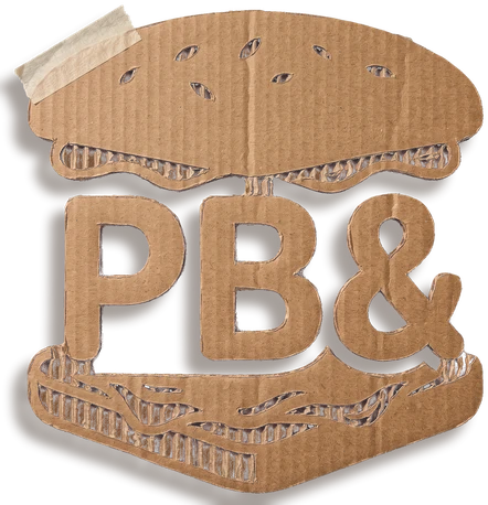 The PB& Games mark, cut out of cardboard: a sandwich with the letters P, B and an ampersand as the filling.
