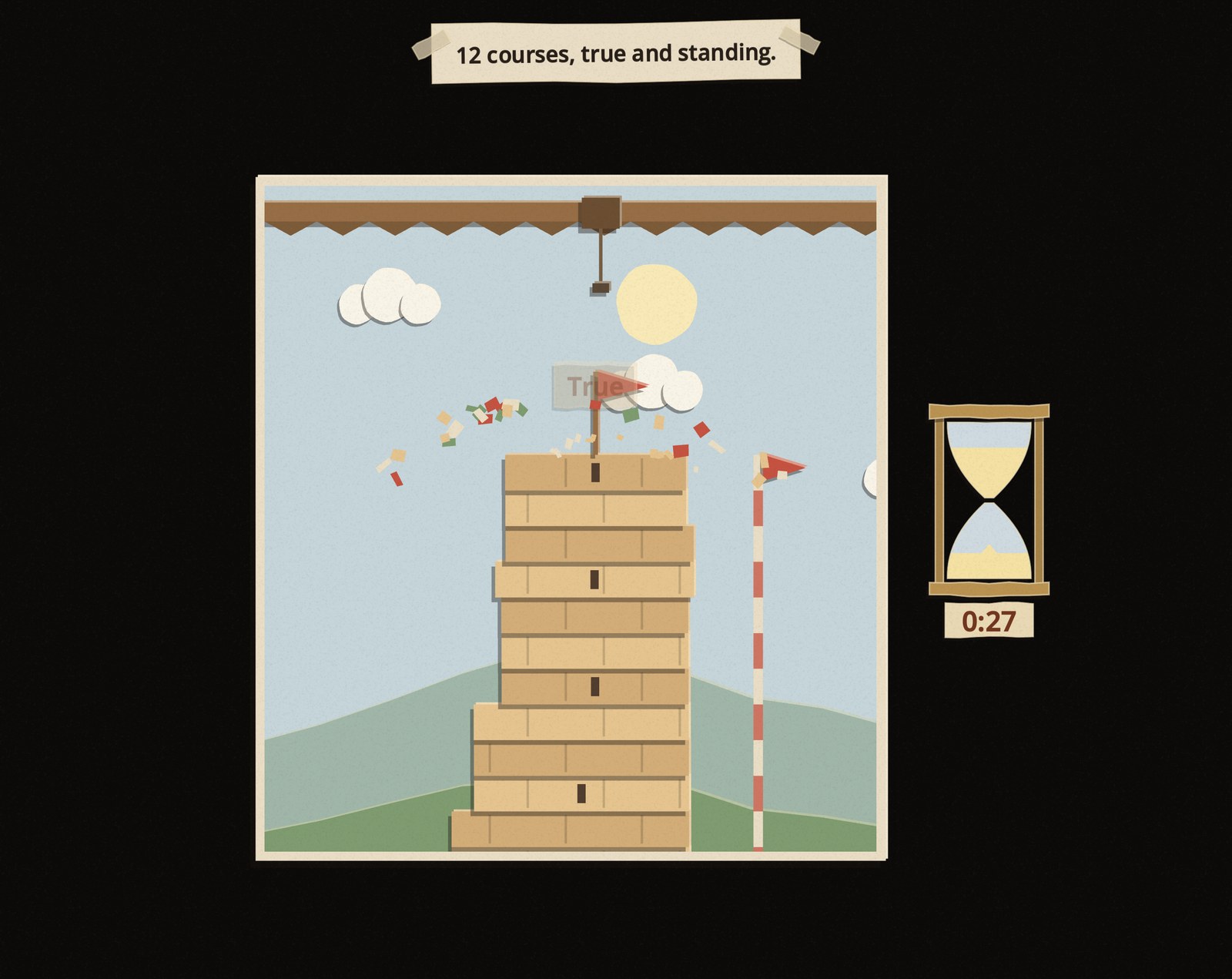 The finished tower of twelve courses with the win pennant on top and paper confetti falling