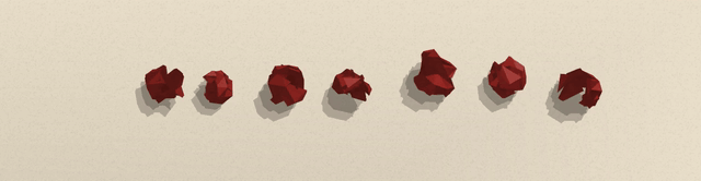 VICTORY unfolding, slowed down: a row of crumpled red paper balls on cream paper opens out one by one into chunky cut letters