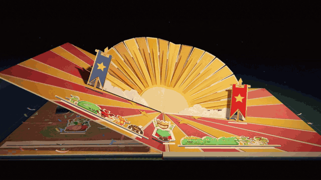 The victory's crowning page: a cut-paper sunburst rises behind the crowned warlord between a blue and a red banner, two poppers fire paper strips and stars across it, and the army pops up either side while the confetti settles on the page