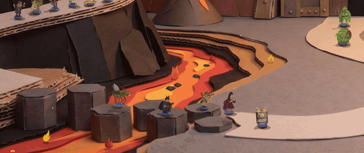 The Cinder Caldera on the Continue menu: standees come down the road from the mine and hop one by one across a row of black basalt columns standing in a river of cut-paper lava, then walk on along the far bank toward the foundry gate