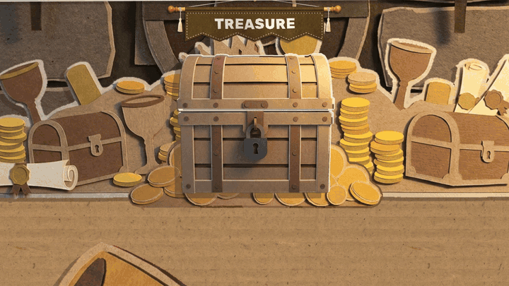 The treasure room's chest on its heap of cut-paper coins, goblets and smaller chests under a TREASURE banner. The chest squats and its lid strains up off the box three times, then swings back over its hinge; a fan of orange, gold and cream card wedges springs up out of the box, paper coins and confetti fly out and rain down onto the desk, and three relic cards fly out of the chest's mouth and land in a row while the chest folds flat into the desk