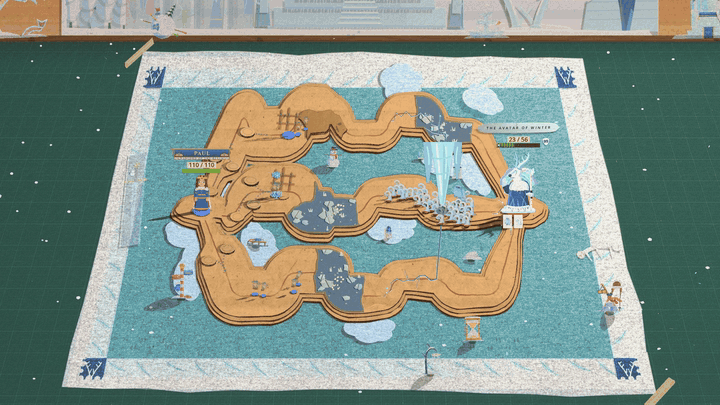 A wide view of a teal felt mat with a cardboard road and white snow drifts, on a green desk under a frosted backdrop. Dark cracks spread out from the right end of the board across the whole mat, and the felt behind them turns into a mosaic of pale blue-white ice plates with long dark splits, from right to left, until the whole mat is ice. Snow falls over the desk