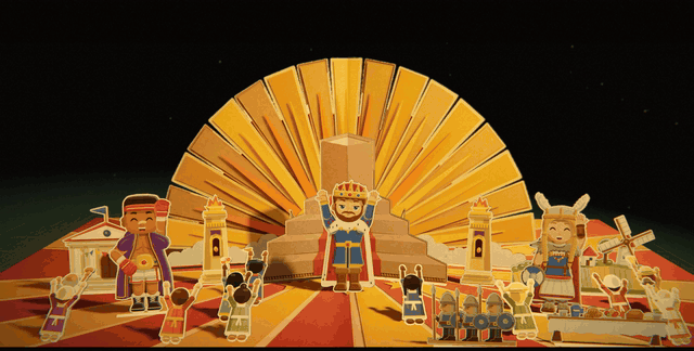 A gold paper crown rises up out of the pyramid in front of the sunburst until it fills the page