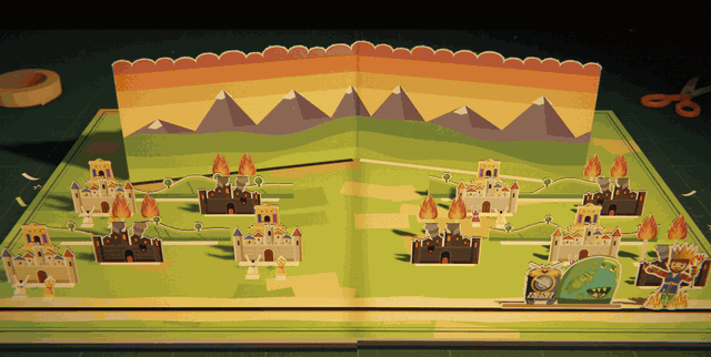 The page turns to a gold temple. The warlord sits on a throne at the top of purple steps under a gold sunburst, two gold statues of the warlord stand on either side, and a crowd of paper people pops up along the front with their arms raised