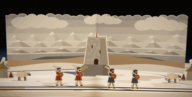 A grey stone tower on a snowy hill with clansmen and low huts around it. A red banner goes up on the tower and snow starts to fall across the page