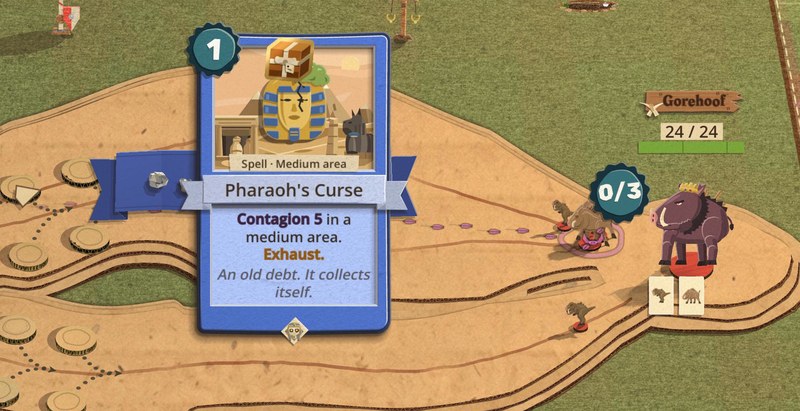 The card Pharaoh's Curse stands enlarged in the middle of a sandy battlefield, with Jim's care package, a small wooden chest, popping on its top edge. A line of purple dots runs from it to a pack of boars and their purple boar lord on the right