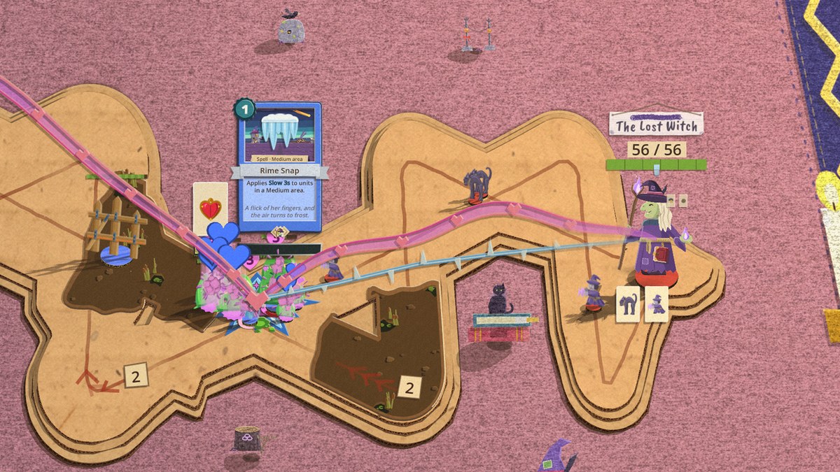 The Lost Witch's turn on her pink felt board, with her hand played out: two black cat Hex Familiars on her roads, a small purple Storm Apprentice at her feet, and her Rime Snap card held up big over a clump of the player's green slimes where her spells land. A pink ribbon of hearts runs from the witch's staff to the slimes and a pale blue spiked line runs beside it. Under her nameplate, at 56 of 56 health, the two cards she played last stand on the board