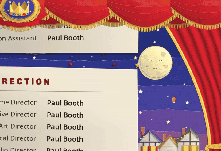 The moon wakes, a rocket rises and sticks in his eye, smoke puffs, he winces and it falls, while the credits roll beside him